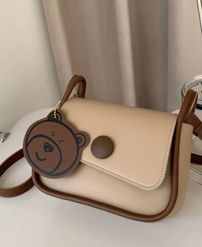Sac carré mini à bouton à rabat avec breloque de sac